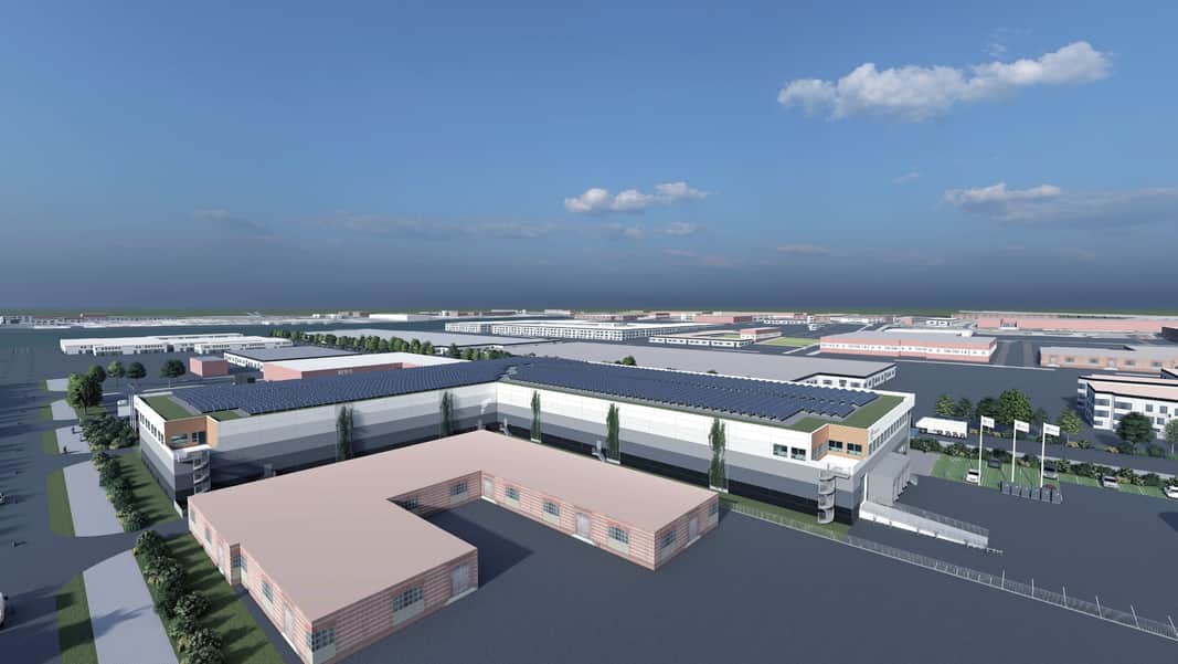 Visionsbild av fastigheten med solceller på taket.