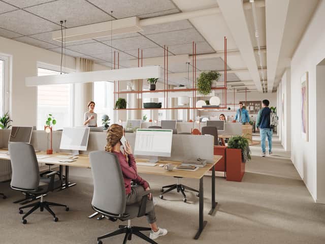 Personer arbetar på kontor