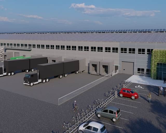 Visionsbild av fastigheten med solceller på taket.