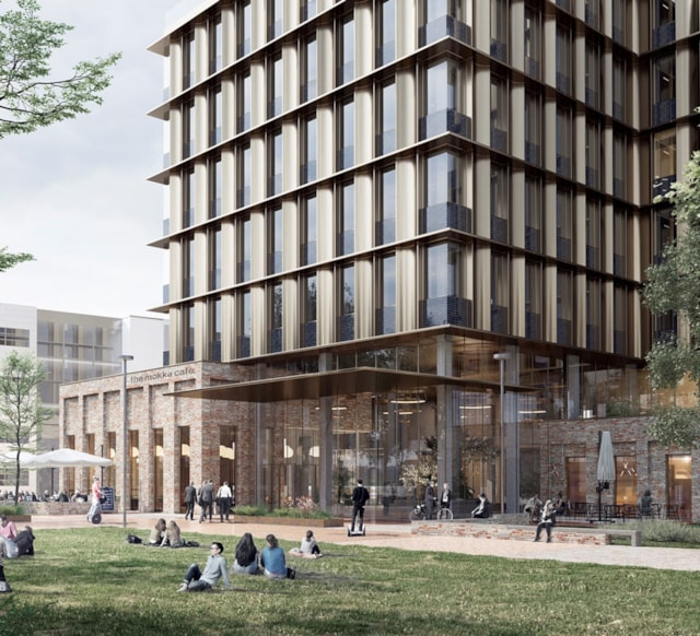 Visionsbild av fastigheten med park utanför.